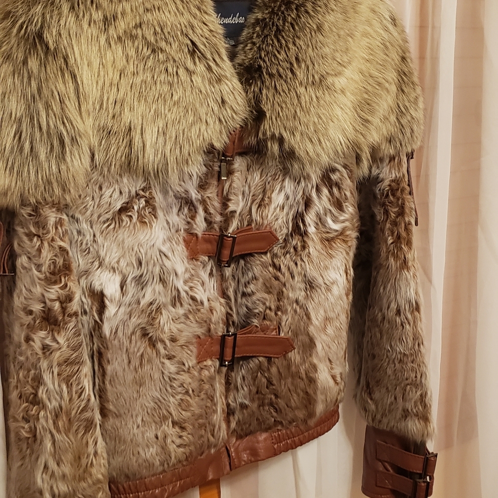 Leather jacket with real fur.